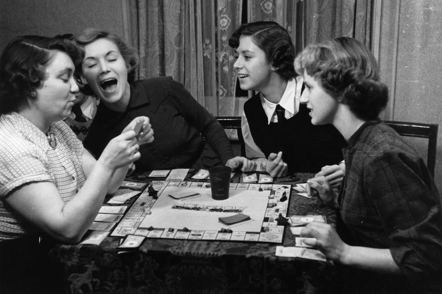 During the Great Depression families and neighbors gathered around Monopoly, which by 1936 was owned by millions of American households.
