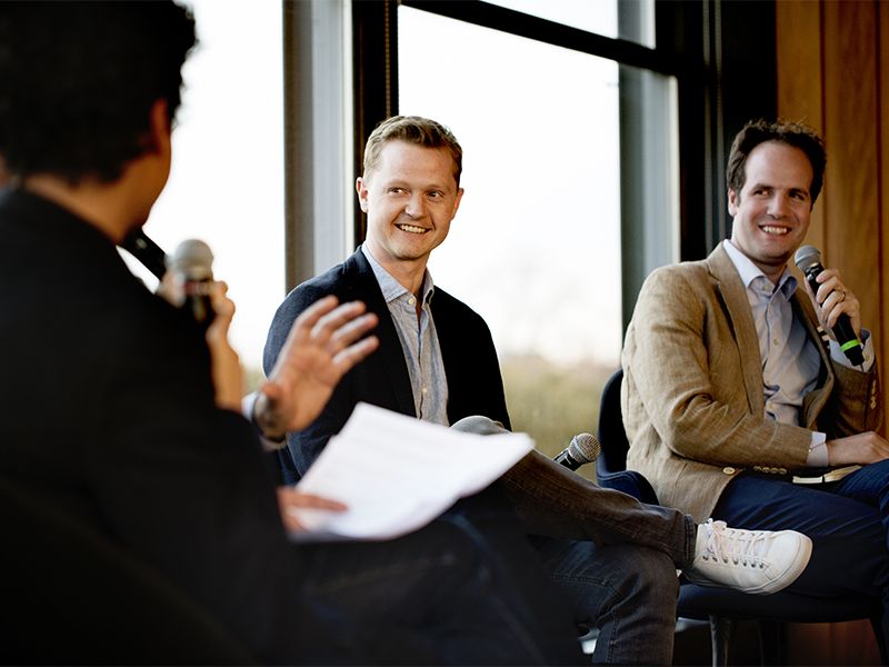 CEO and founder of Trustpilot Peter Holten Muhlmann (center) in conversation with Index partner Ben Holmes (right)